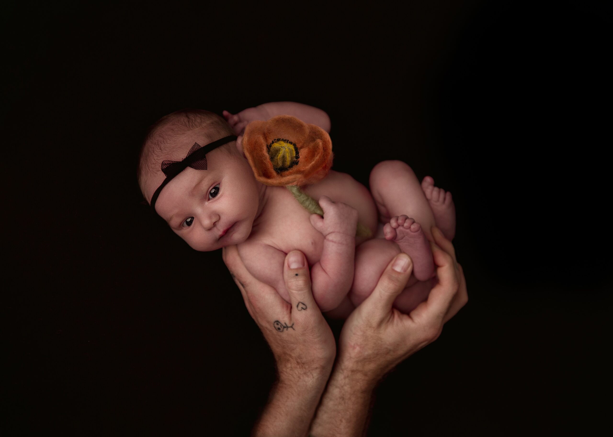 I want newborn photos taken but I am unsure if I want to be in them.